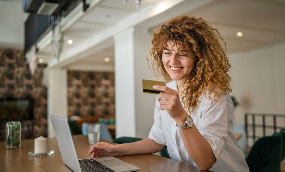 woman purchasing services using payment services online