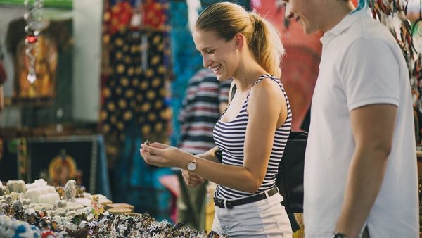 woman and man shopping in a popup shop during holidays