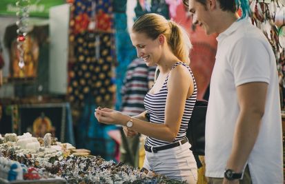 woman and man shopping in a popup shop during holidays