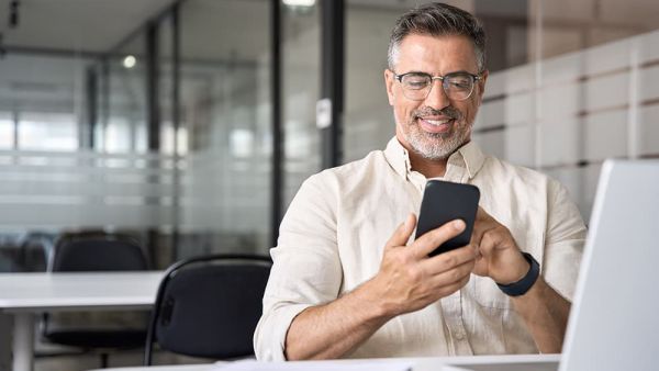 man making payment on mobile phone wallet